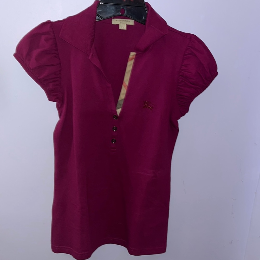 Burberry polo shirt.